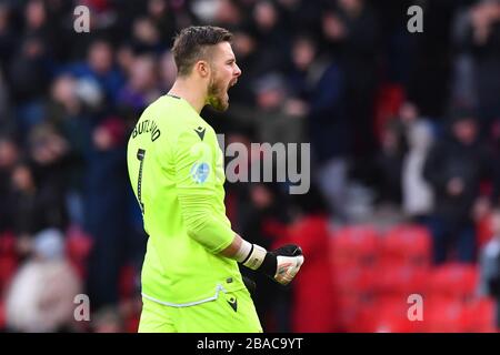 Il portiere di Stoke City, Jack Butland, celebra il secondo obiettivo del gioco di Stoke City, Tom Ince Foto Stock