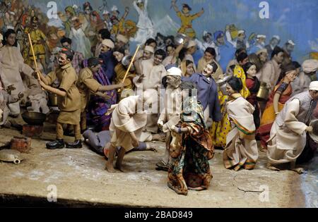 Scene della vita del Mahatma Gandhi: Mahatma Gandhi rompono la nefasta legge del sale, il museo mani Bhavan Gandhi a Mumbai, India Foto Stock
