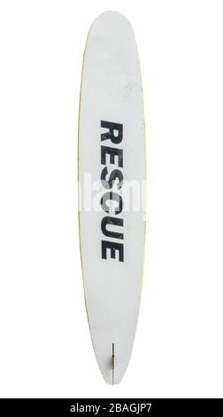 Isolato grungy Old Lifeguard Rescue Surfboard da Waikiki, Hawaii Foto Stock