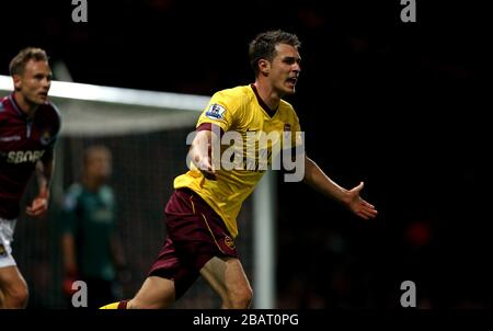 Aaron Ramsey dell'Arsenal reagisce durante la partita Foto Stock