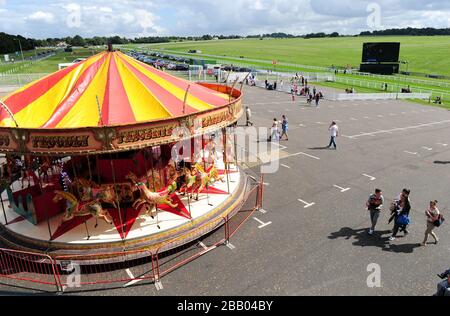 La giostra all'ippodromo di Epsom Downs Foto Stock