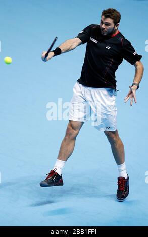 Stanislas Wawrinka compete contro David Ferrer durante il quinto giorno delle finali dell'ATP World Tour di Barclays Foto Stock