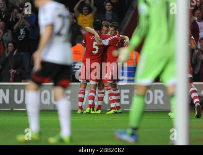 Rickie Lambert (centro) di Southampton celebra il suo primo gol Foto Stock