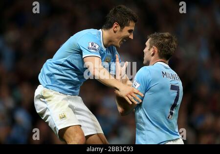 Stevan Jovetic della città di Manchester celebra il terzo obiettivo. Foto Stock