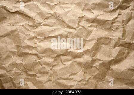 Carta da artigianato marrone stropicciata dettaglio di texture Foto Stock