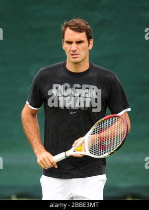 Roger Federer in Svizzera durante una sessione di pratica presso il All England Lawn Tennis and Croquet Club di Wimbledon. Foto Stock