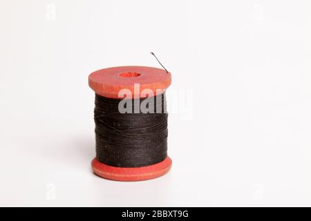Bobina di legno con filettatura Foto Stock