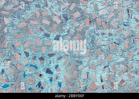 trama astratta di muro di cemento con motivo a mosaico casuale Foto Stock