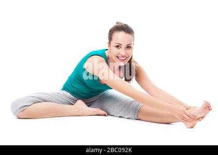 La donna a praticare yoga Foto Stock