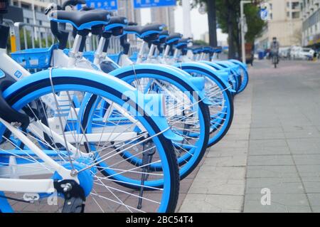 Shenzhen, Cina: Nuovo Ciao biciclette sulla strada, si può guidare senza un deposito Foto Stock