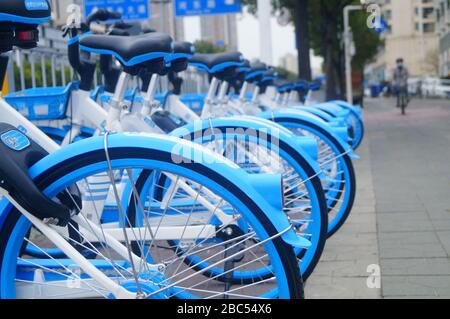 Shenzhen, Cina: Nuovo Ciao biciclette sulla strada, si può guidare senza un deposito Foto Stock