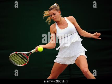 Camila Giorgi italiana in azione contro l'Agnieszka Radwanska polacca Foto Stock