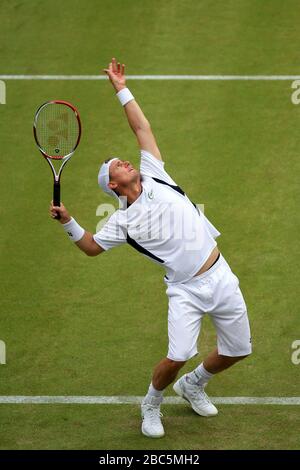 Lleyton Hewitt in Australia in azione contro Jo-Wilfried Tsonga in Francia Foto Stock