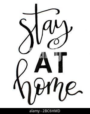 Iscrizione a mano nera PRESSO HOMEON SU sfondo bianco Foto Stock