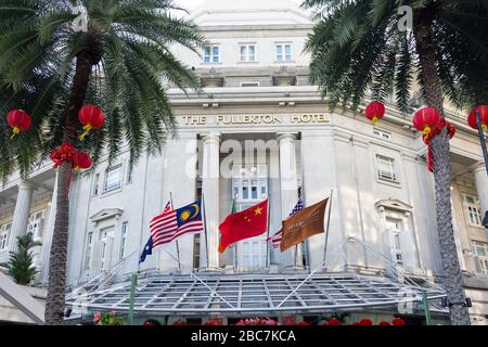 Ingresso al Fullerton Hotel, Boat Quay, Central Business District (CBD), Downtown Core, Central Area, Singapore Foto Stock