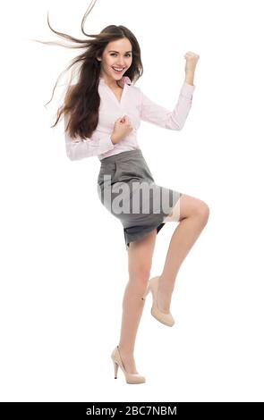 Donna entusiasta pugni clenching Foto Stock