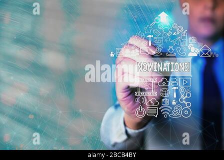 La scrittura della nota mostra le candidature. Il concetto di business per azione di nominare o essendo stato nominato per il premio Foto Stock