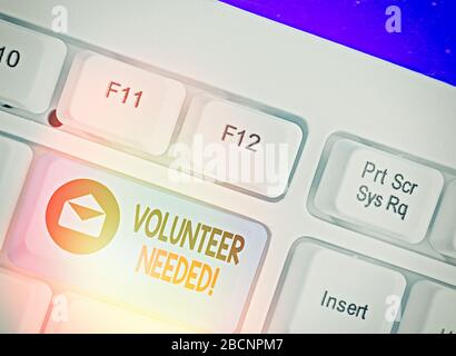 Scrittura di testo necessari volontari. Foto concettuale necessario lavorare per organizzazione senza essere pagati Foto Stock