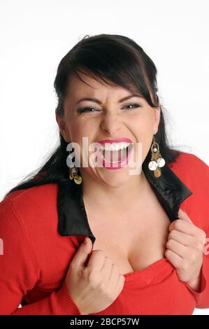 Donna bruna in maglione rosso. Foto Stock