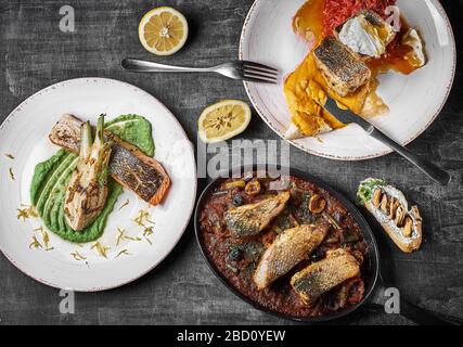 Piatto di pesce di tre portate Pike Perch, bistecca di salmone, persico stufato. Menu dietetico. Menu di pesce. Frutti di mare. Concetto di cibo sano. Foto Stock