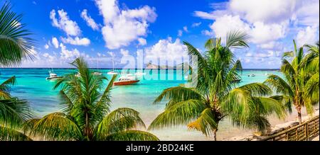 Bella Cap Malheureux, vista sul mare turchese e palme, isola di Mauritius. Foto Stock