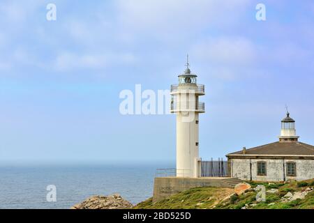 Faro di Turiñan capo, Spagna Foto Stock