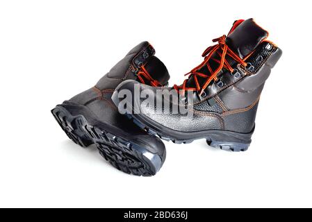 Stivali neri alti con lacci arancioni su sfondo bianco, scarpe fuoristrada,  isolato, primo piano Foto stock - Alamy