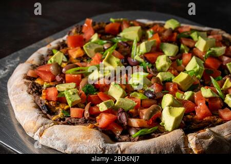 Pizza Taco su buccia di acciaio. Foto Stock