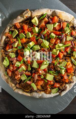 Pizza Taco su buccia di acciaio. Foto Stock