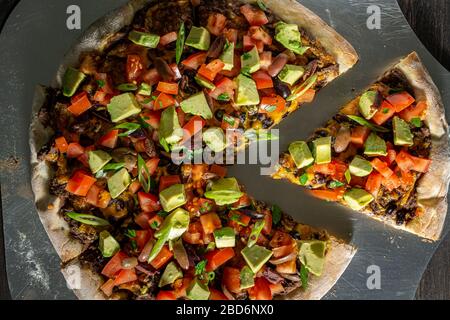 Pizza Taco su buccia di acciaio. Foto Stock