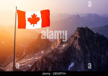 Canadian National Flag Composite Over the Aerial View of Beautiful Rocky Mountain Foto Stock