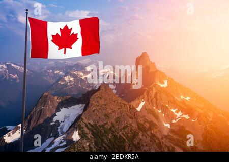 Canadian National Flag Composite Over the Aerial View of Beautiful Rocky Mountain Foto Stock