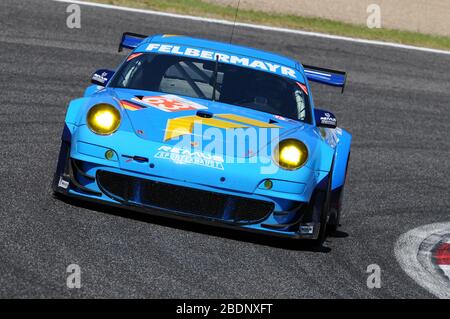 Imola, Italia 3 luglio 2011: Porsche 997 GT3 RSR GTE sono del Team Proton Competition guidato da Gianluca Roda e Patrick Long in azione. Foto Stock