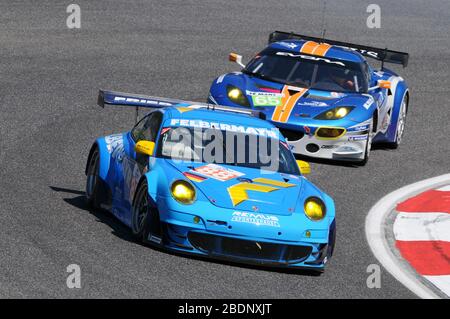 Imola, Italia 3 luglio 2011: Porsche 997 GT3 RSR GTE am del Team Felbermayr Proton guidato da Felbermayr Jr e Christian Ried in azione. Foto Stock