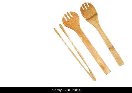 pinze in legno e cucchiai grandi per la cucina casalinga. Foto Stock
