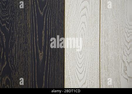 Legno di tessitura. Dipinta in bianco e nero. Patina d'oro e bronzo. Sfondo strutturato. Foto Stock