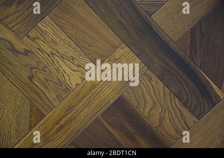 Parquet di quercia, in doghe. Sfondo in legno testurizzato. Marrone, verde e grigio. Foto Stock