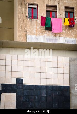 Muro nel quartiere El Raval di Barcellona, Spagna. Foto Stock