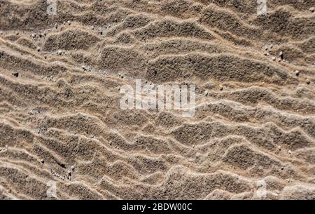 Superficie in pietra arenaria naturale con ondulazione superficie ruvida ideale come sfondo Foto Stock