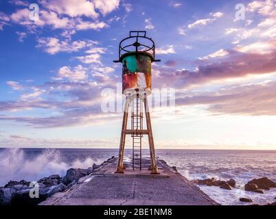 Jetty e faro di Saint Pierre, La Reunion Island, Oceano Indiano, 26 aprile 2016, Saint Pierre, Francia Foto Stock