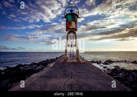 Jetty e faro di Saint Pierre, La Reunion Island, Oceano Indiano, 26 aprile 2016, Saint Pierre, Francia Foto Stock