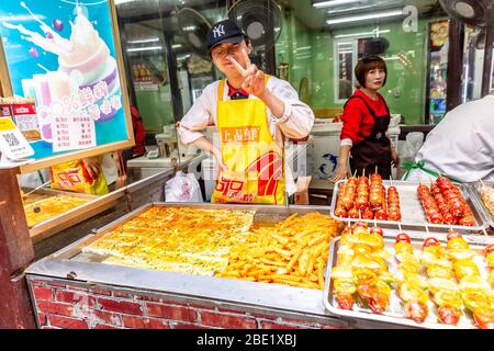 Venditore di cibo di strada in cina. Foto Stock