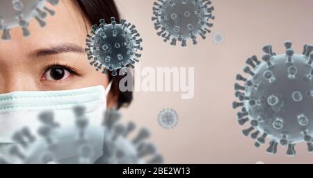 giovane donna asiatica che indossa maschera facciale mostrando paura per il coronavirus covid-19 Foto Stock