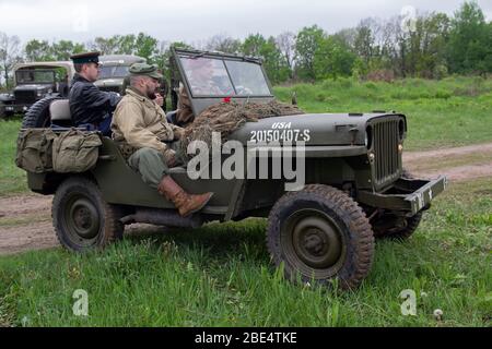 Kiev, Ucraina - 09 maggio 2019: Jeep dell'esercito americano ad una ricostruzione storica in onore dell'anniversario della vittoria nella seconda guerra mondiale Foto Stock