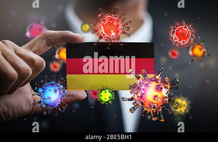 Corona Virus Around Germany Flag. Concetto epidemia pandemica nel paese Foto Stock