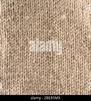 frammento di tessuto a maglia di lana marrone chiaro di pecora, pigtail pattern Foto Stock