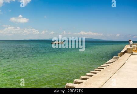 Passeggiate lungo la costa, Isola di Ishigaki, Giappone Foto Stock