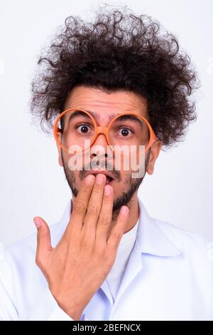 Viso di medico turco con capelli ricci Foto Stock