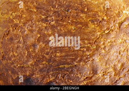 Crosta di pane marrone crosta astratta sfondo modello primo piano Foto Stock