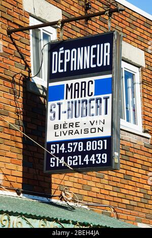 Cartello appeso per un dépanneur (minimarket) a Laval, provincia di Quebec, Canda. Foto Stock